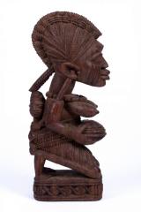 Figure of a Kneeling Woman with Child and Covered Bowl (Olumeye)