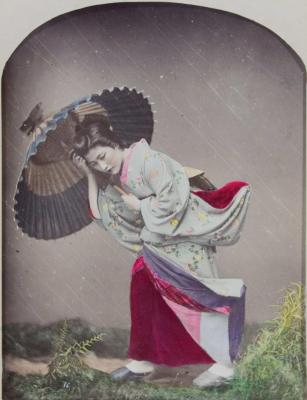 Young Woman with Umbrella