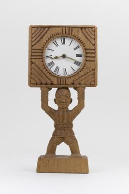 Male Figure Holding Clock