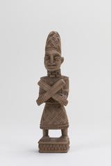 Standing Male Figure Holding Crossed Batons