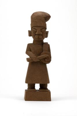 Partially Carved Figure of a Drummer